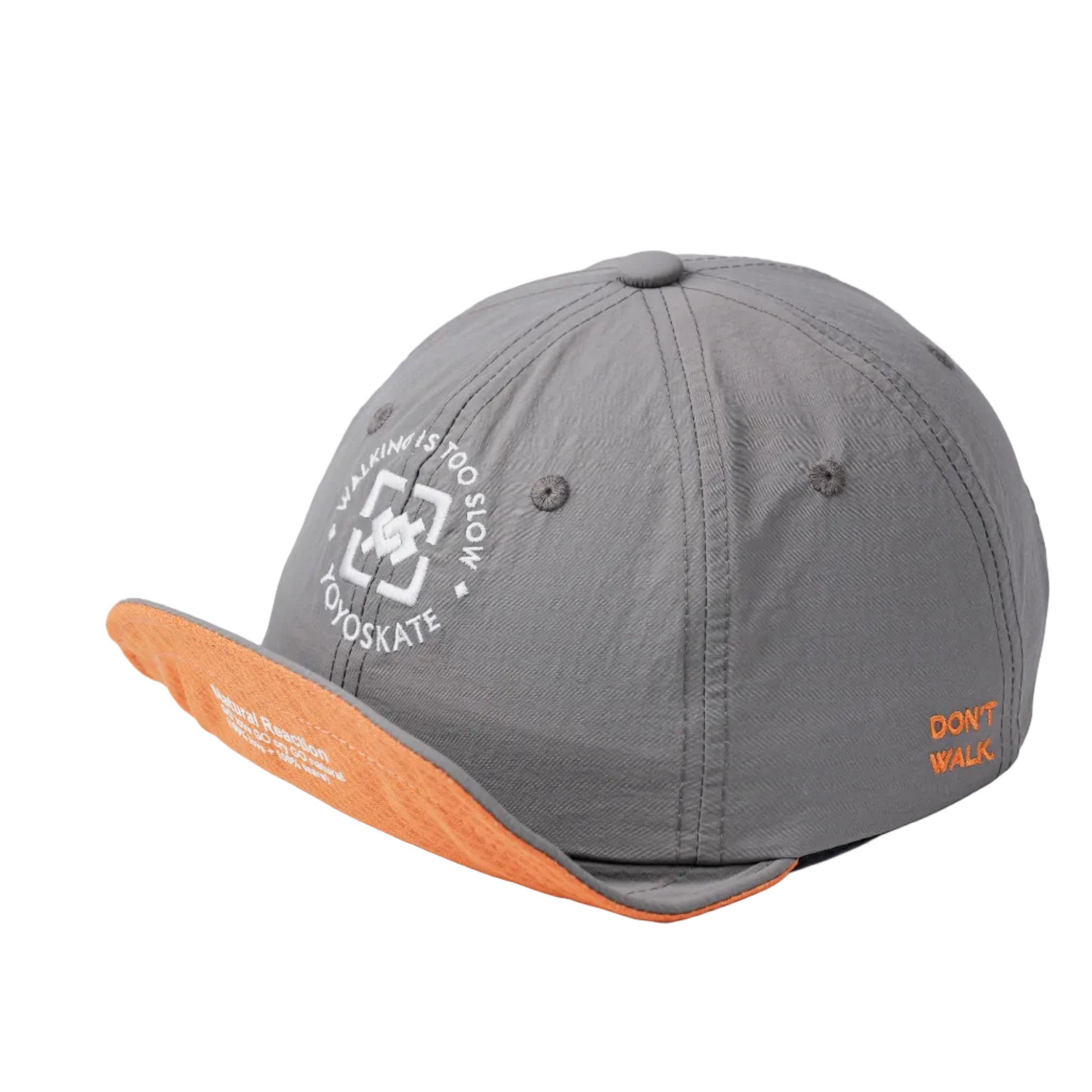 A gray athletic cap with an orange underside on the brim, featuring a white circular logo on the front and orange text on the side, photographed on a white studio background.