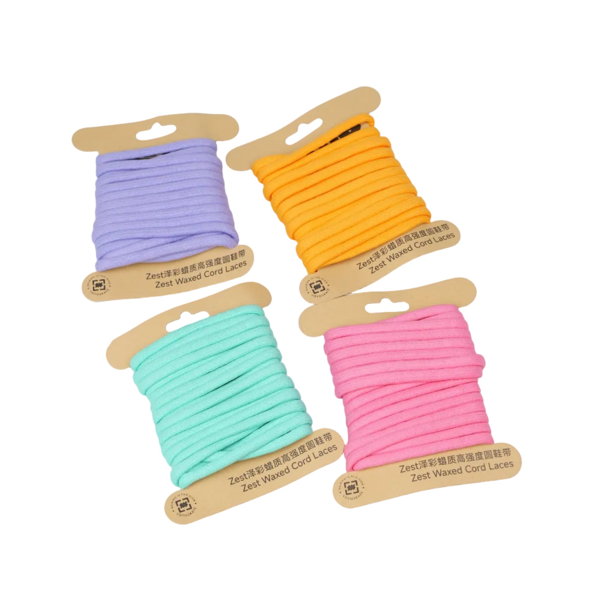 Four spools of elastic cord in pastel purple, orange, mint green, and pink, each mounted on a small wooden card with printed text, arranged on a clean white background.