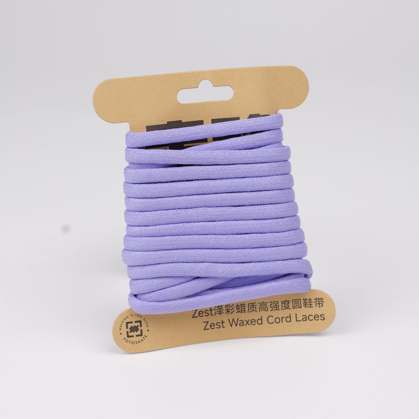 Purple cord laces wound around a cardboard hanger, photographed on a clean white background.